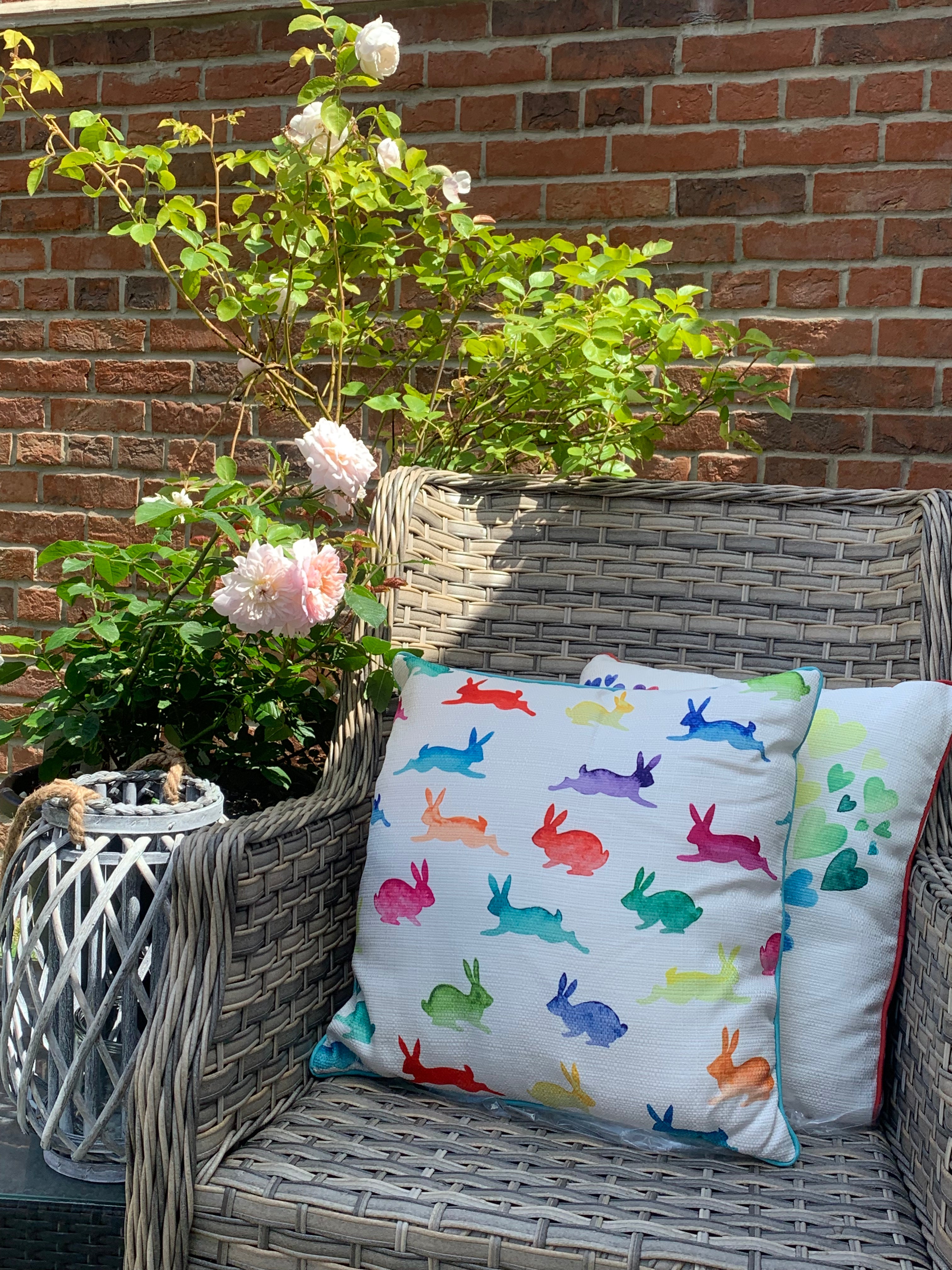 Colorful Rainbow Brights cushion by Shabbyquins featuring vibrant rainbow patterns and soft fabric in two stylish designs.