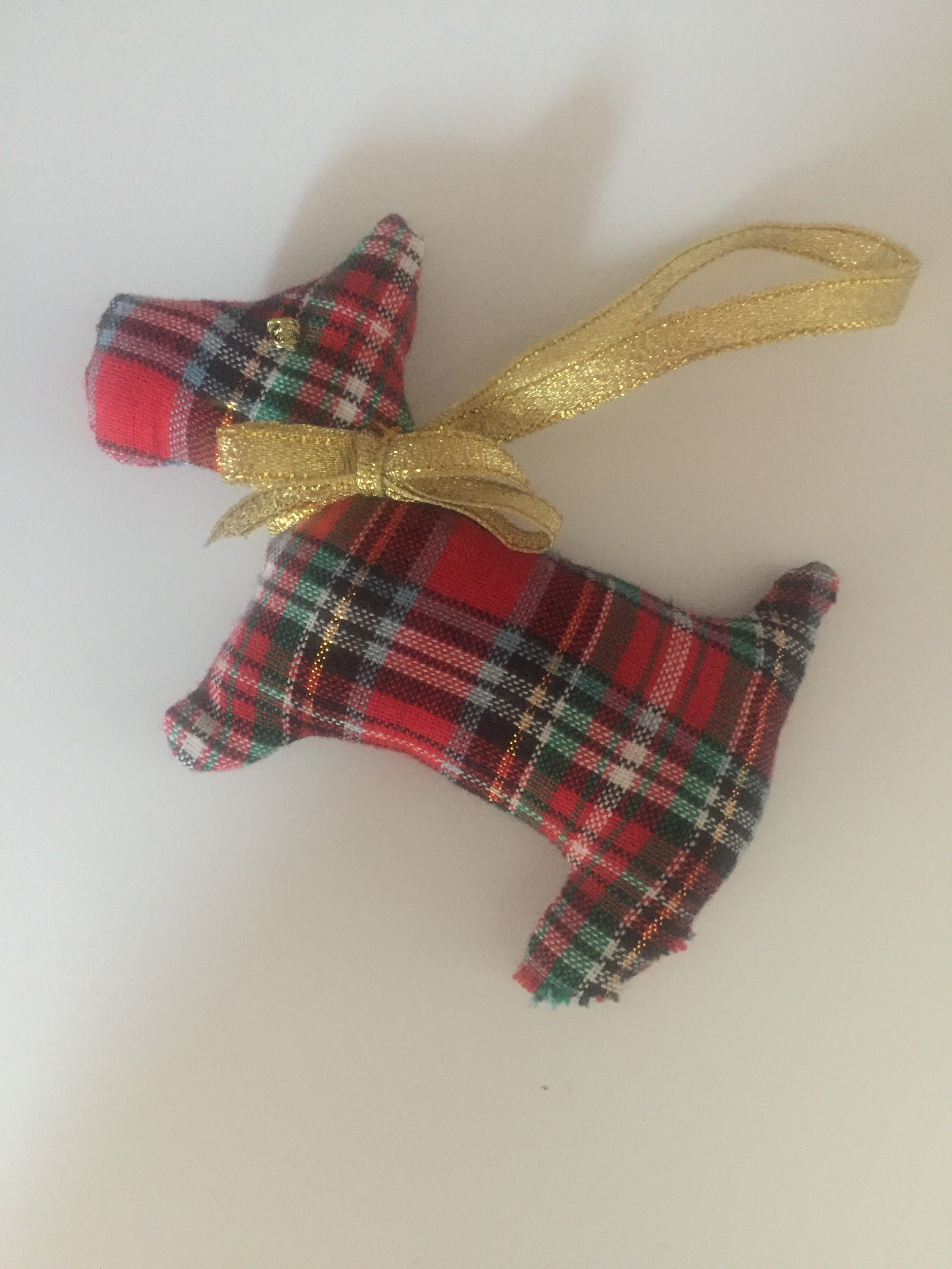 Handmade Christmas Tree Ornaments by Sable Homeware, featuring festive, decorative ornaments displayed on a Christmas tree.