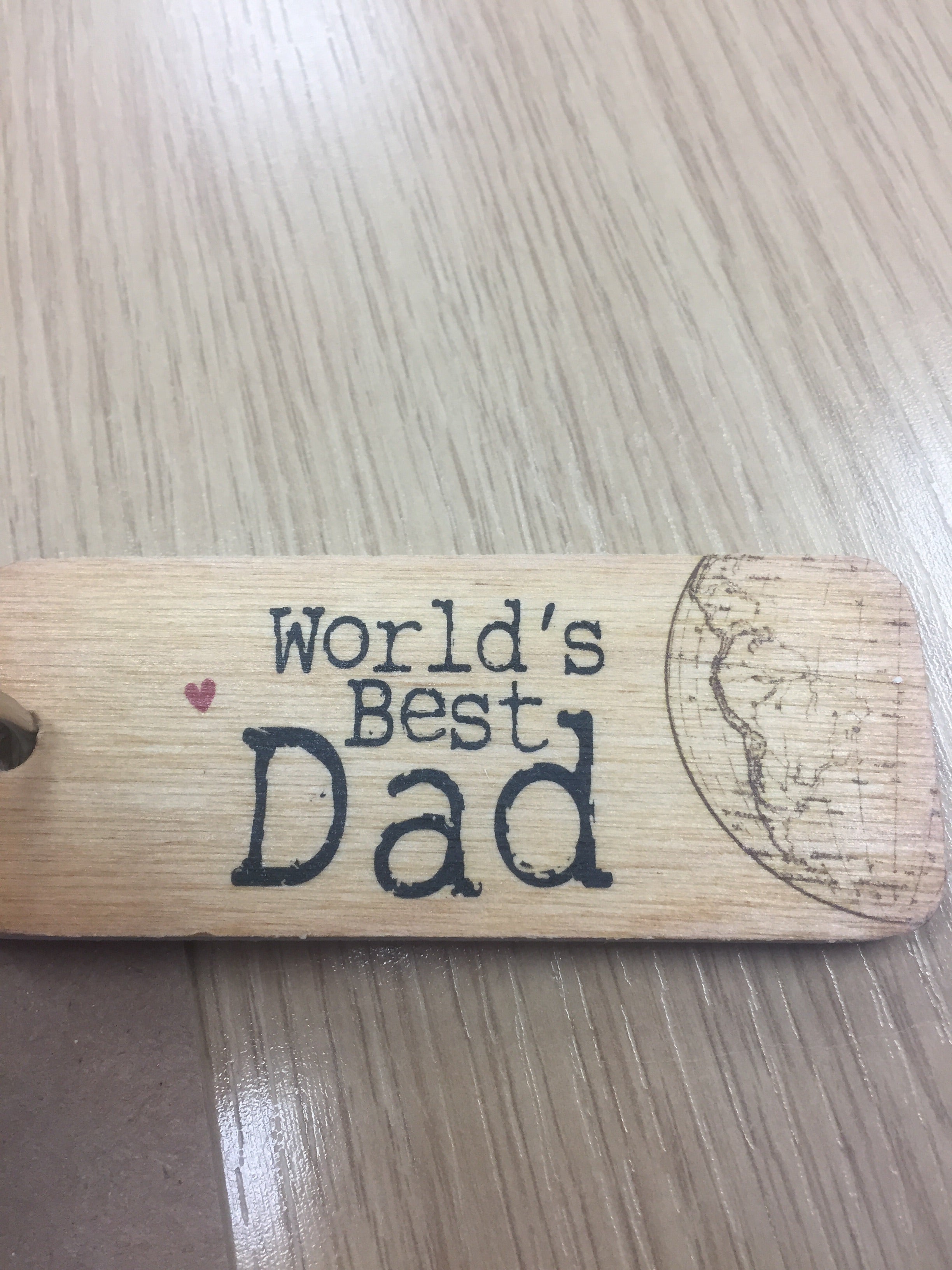 Handmade chunky wooden keyring from Sable Homeware with a natural finish and polished surface, ideal for keys or accessories.