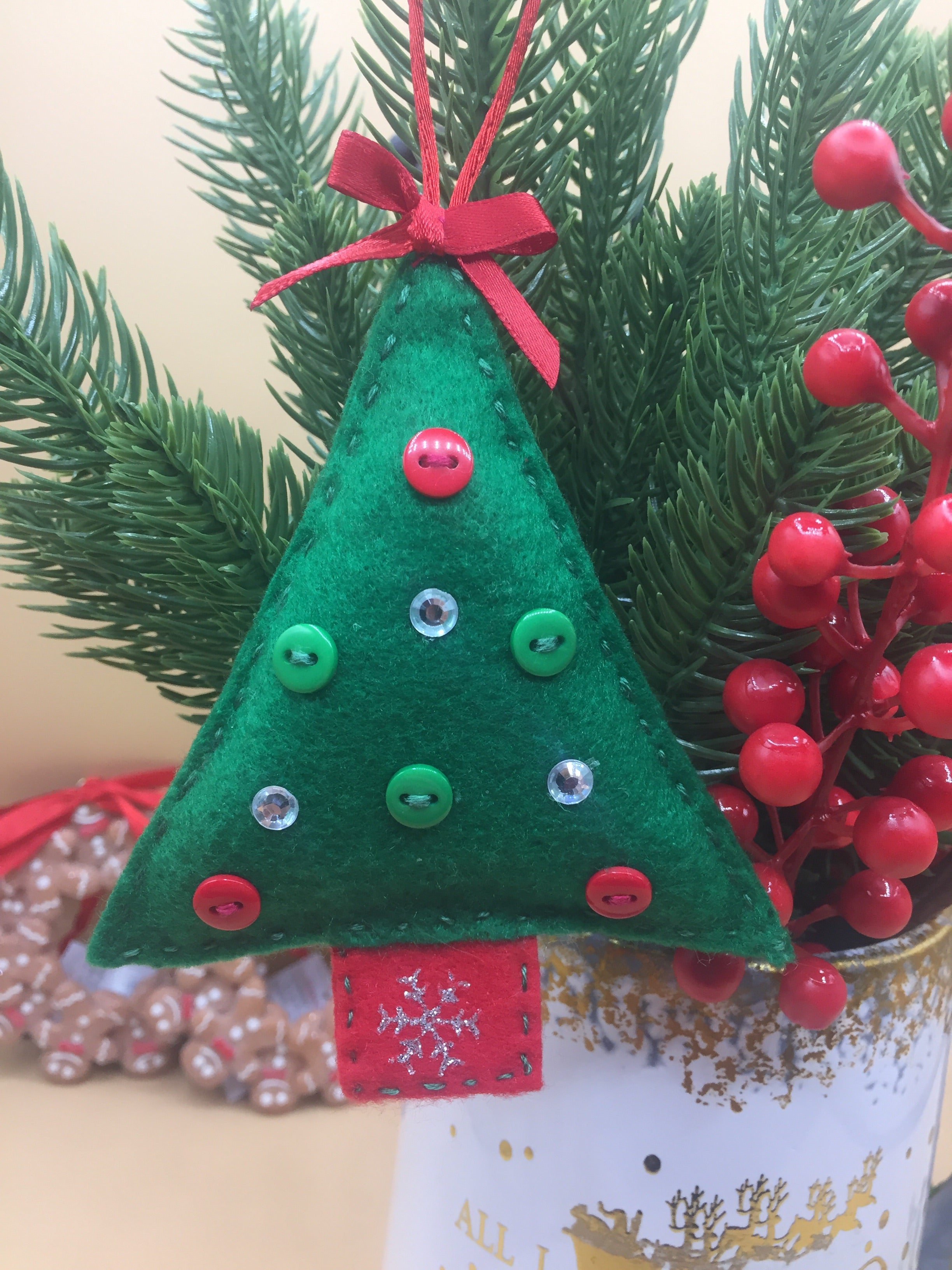 Handmade Christmas tree ornaments from Sable Homeware, featuring colorful decorative decorations for holiday trees.