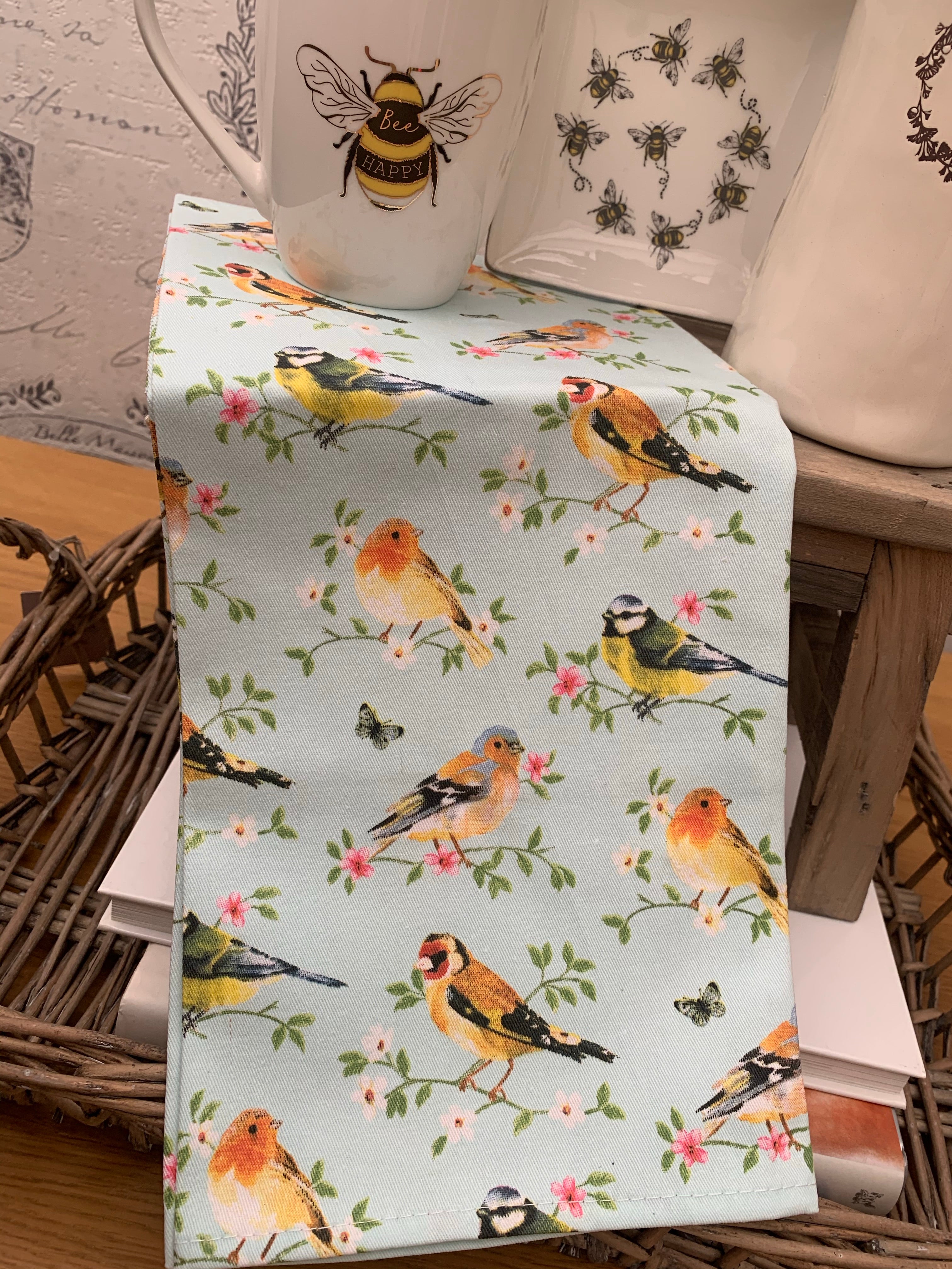 Birds & Blossom Tea Towel by Sable Homeware — pastel blue with birds and blossom print on 100% polyester.