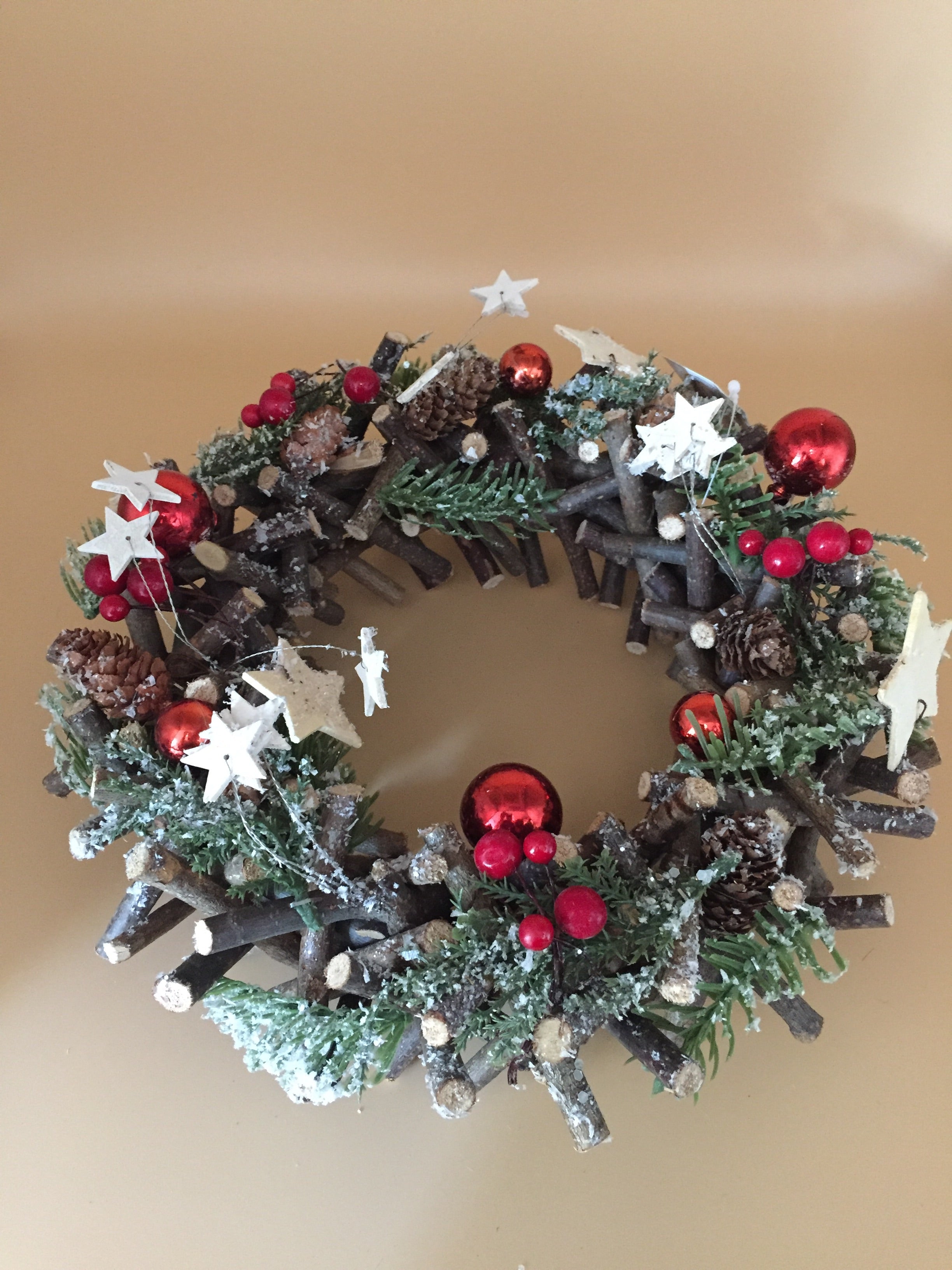 Large red and woodland white stars round Christmas wreath, Shabbyquins decorative holiday ornament with festive star patterns.