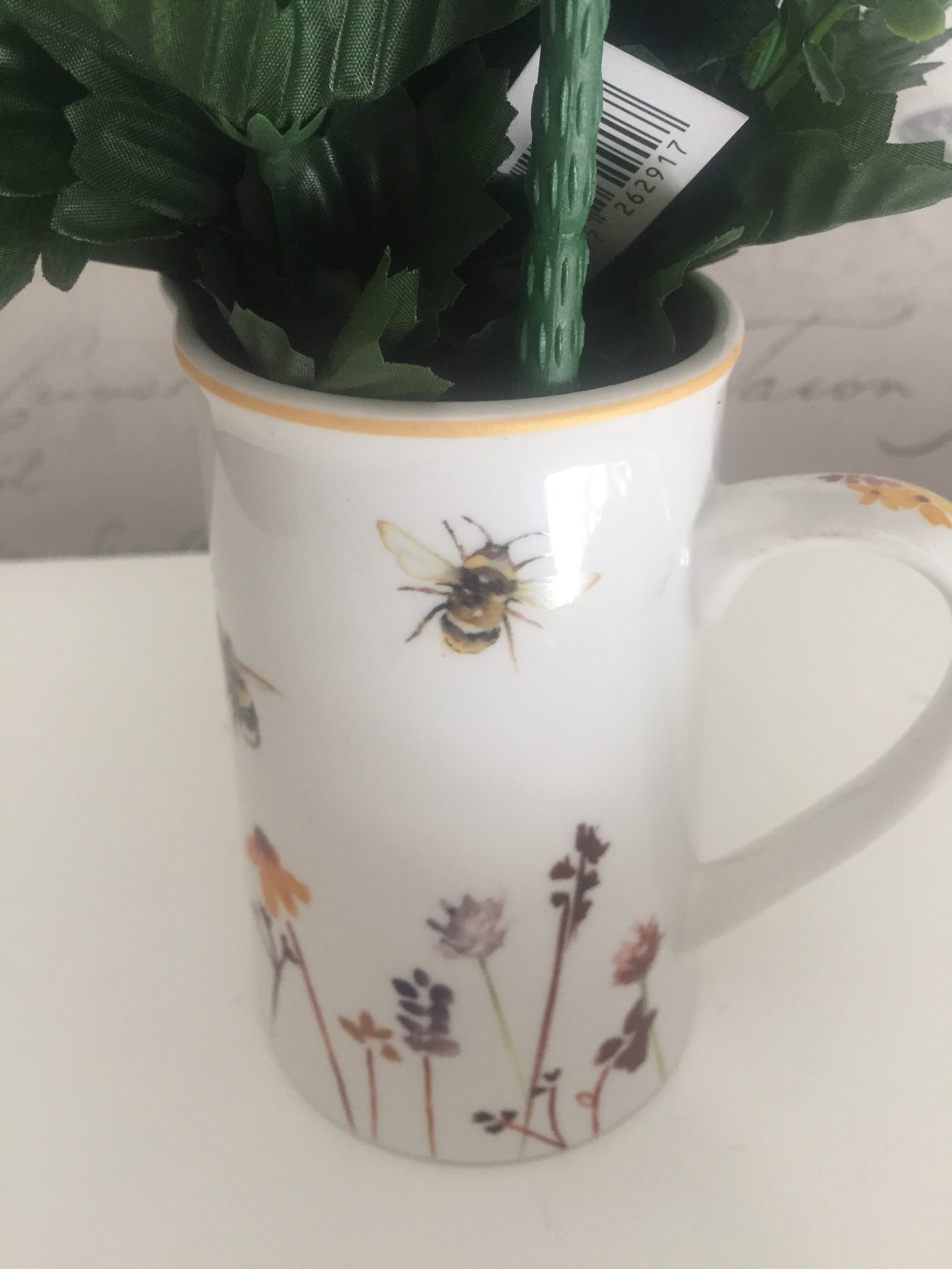 Small Busy Bees jug by Shabbyquins featuring colorful bee illustrations, ideal for serving beverages or decorative display.