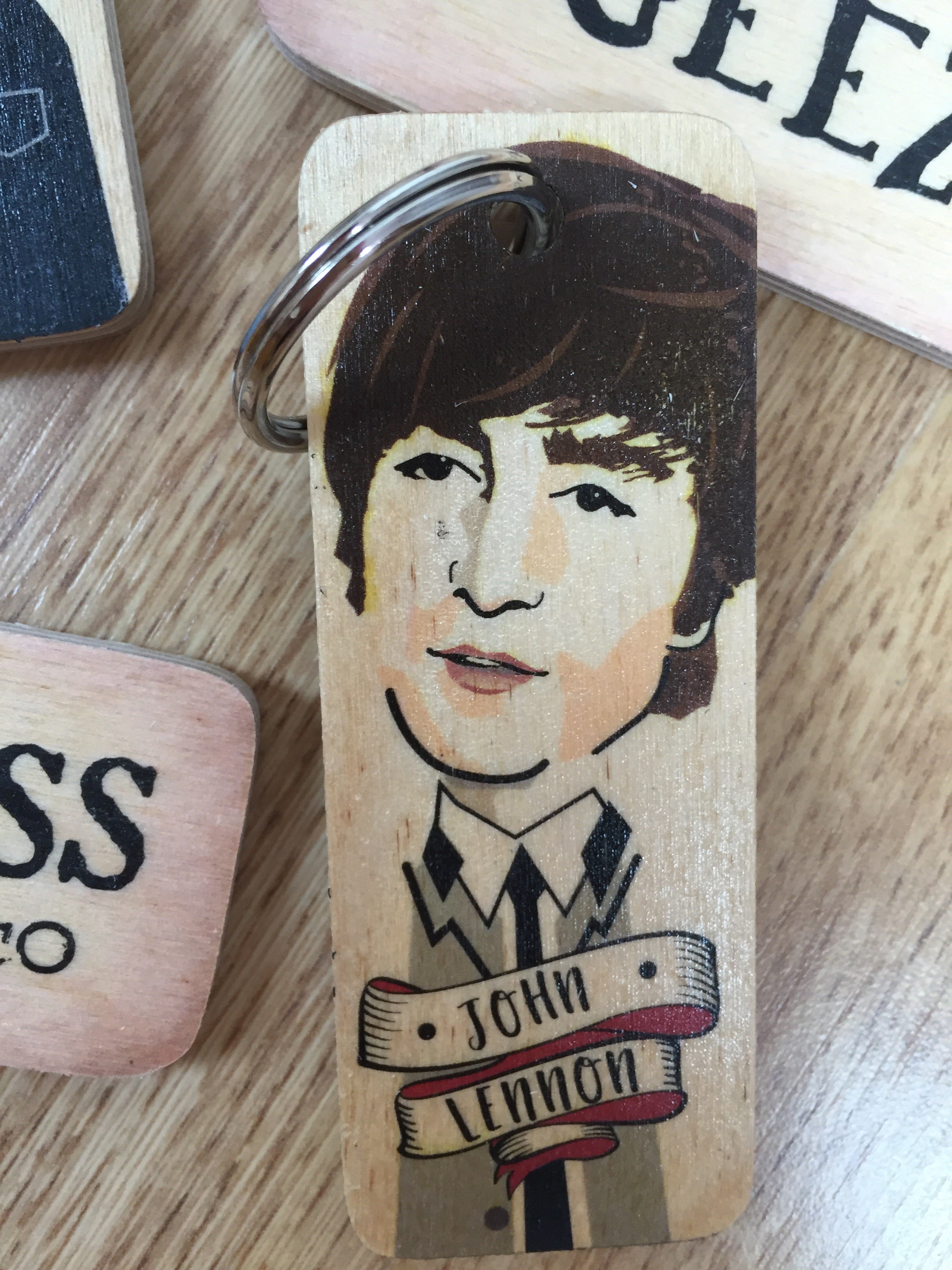 Handmade chunky wooden keyring by Sable Homeware with a natural finish and sturdy metal ring, perfect for keys or decorative use.