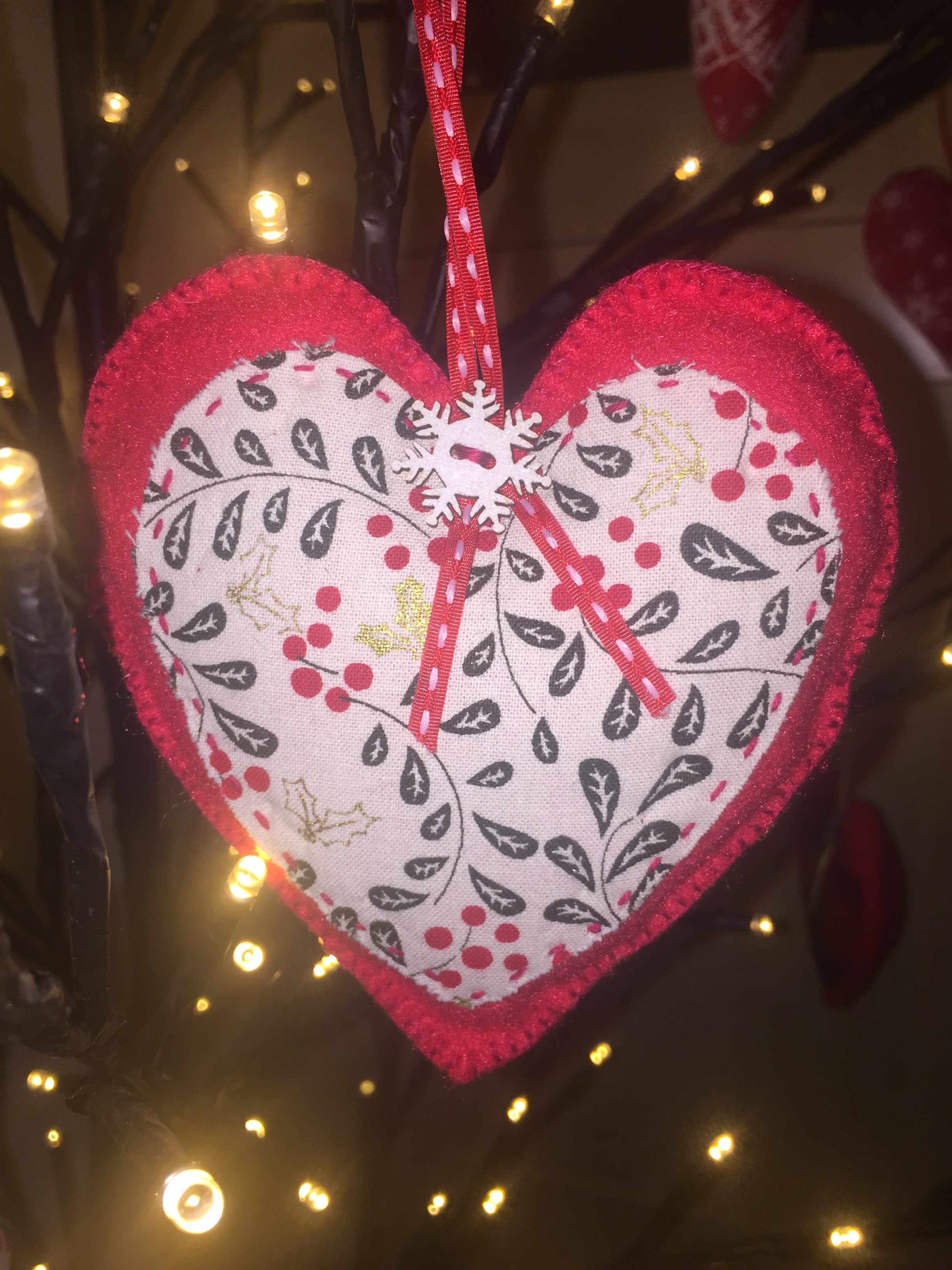 Handmade Christmas tree ornaments from Sable Homeware featuring festive designs and colorful holiday decorations.