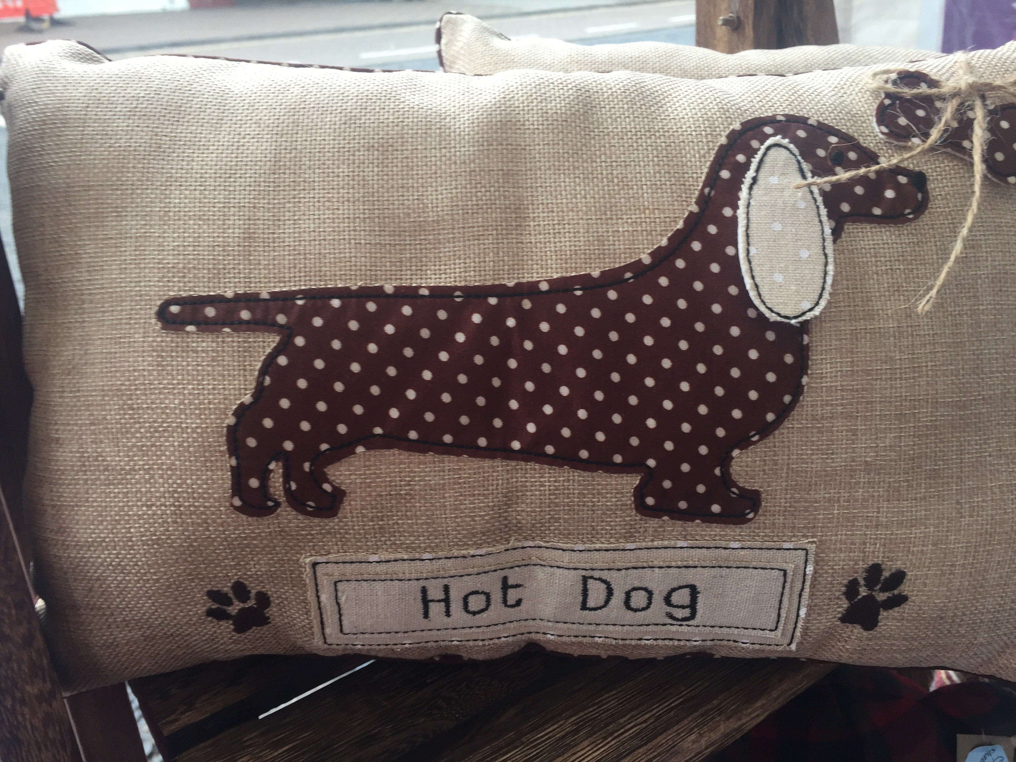 Shabbyquins Silly Sausage Oblong Cushion with colorful, playful fabric and soft filling, perfect for cozy home decor.