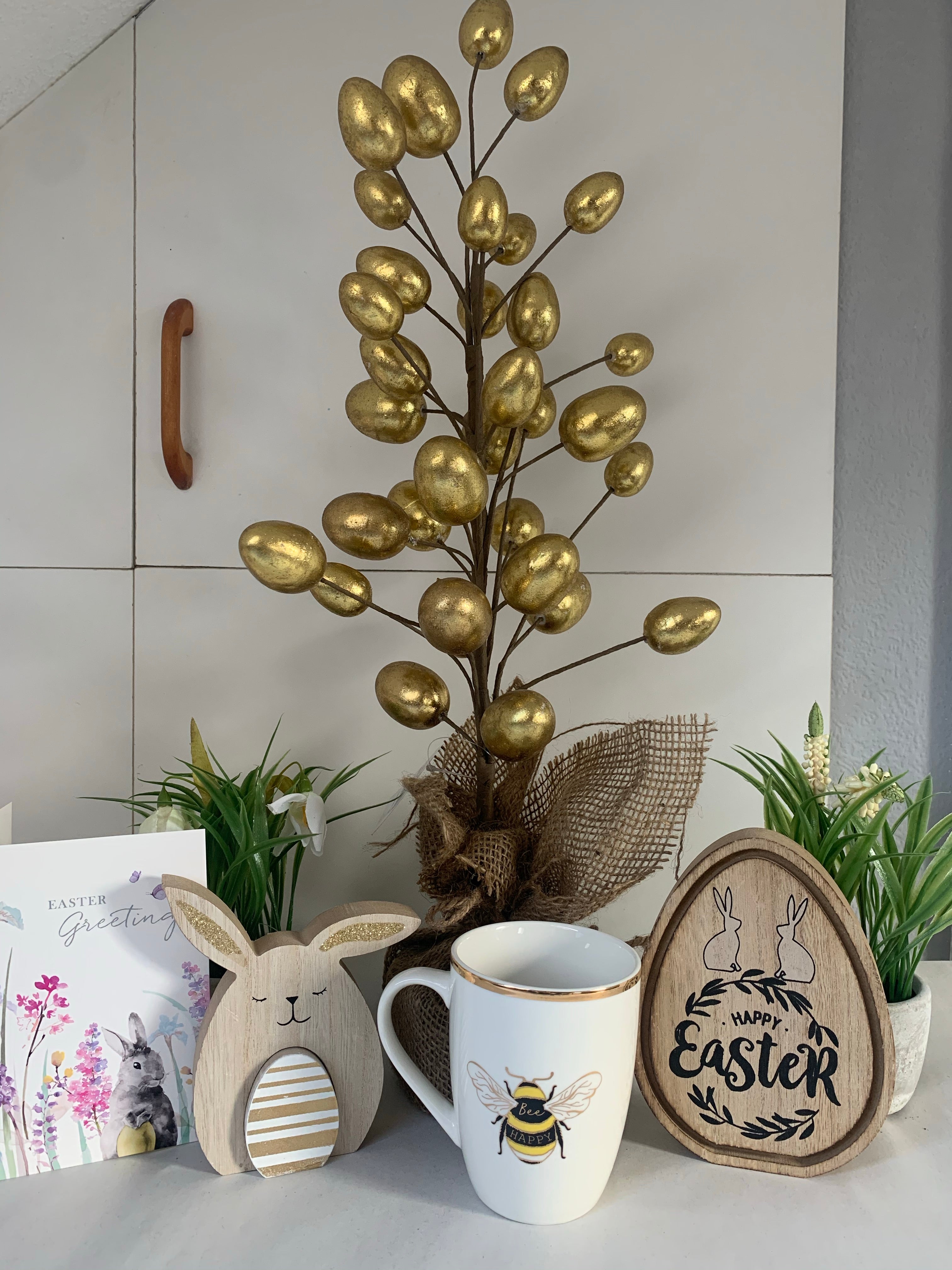 White and gold ceramic mug with "Bee Happy" design from Sable Homeware, perfect for coffee or tea.