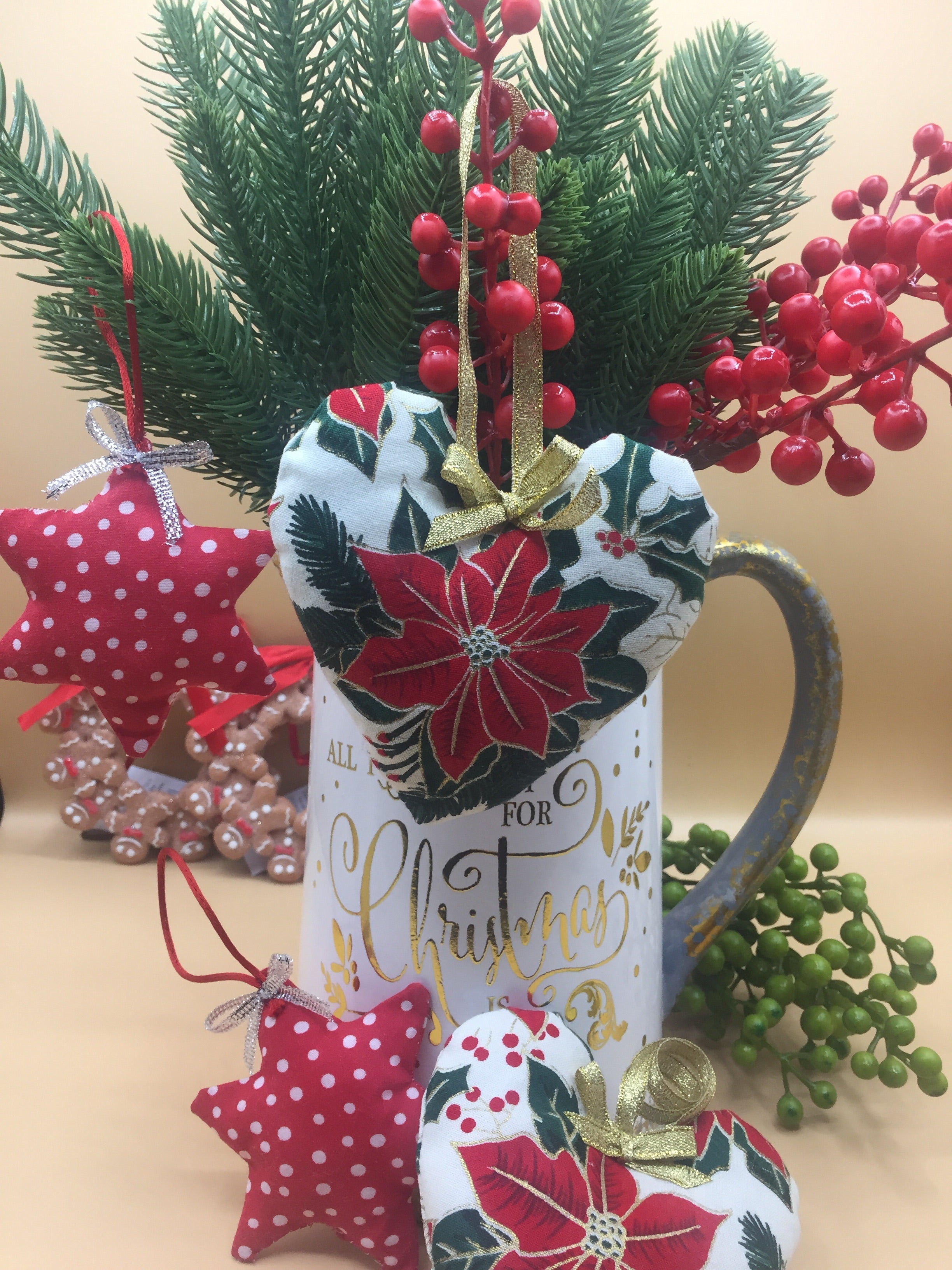 Handmade Christmas Tree Decorations by Sable Homeware, colorful and festive Christmas tree ornaments on a decorated tree.