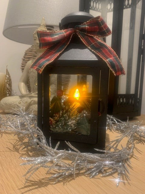 Sable Homeware cosy winter lantern with metal frame and glass panels, perfect for warm outdoor or indoor winter decor.